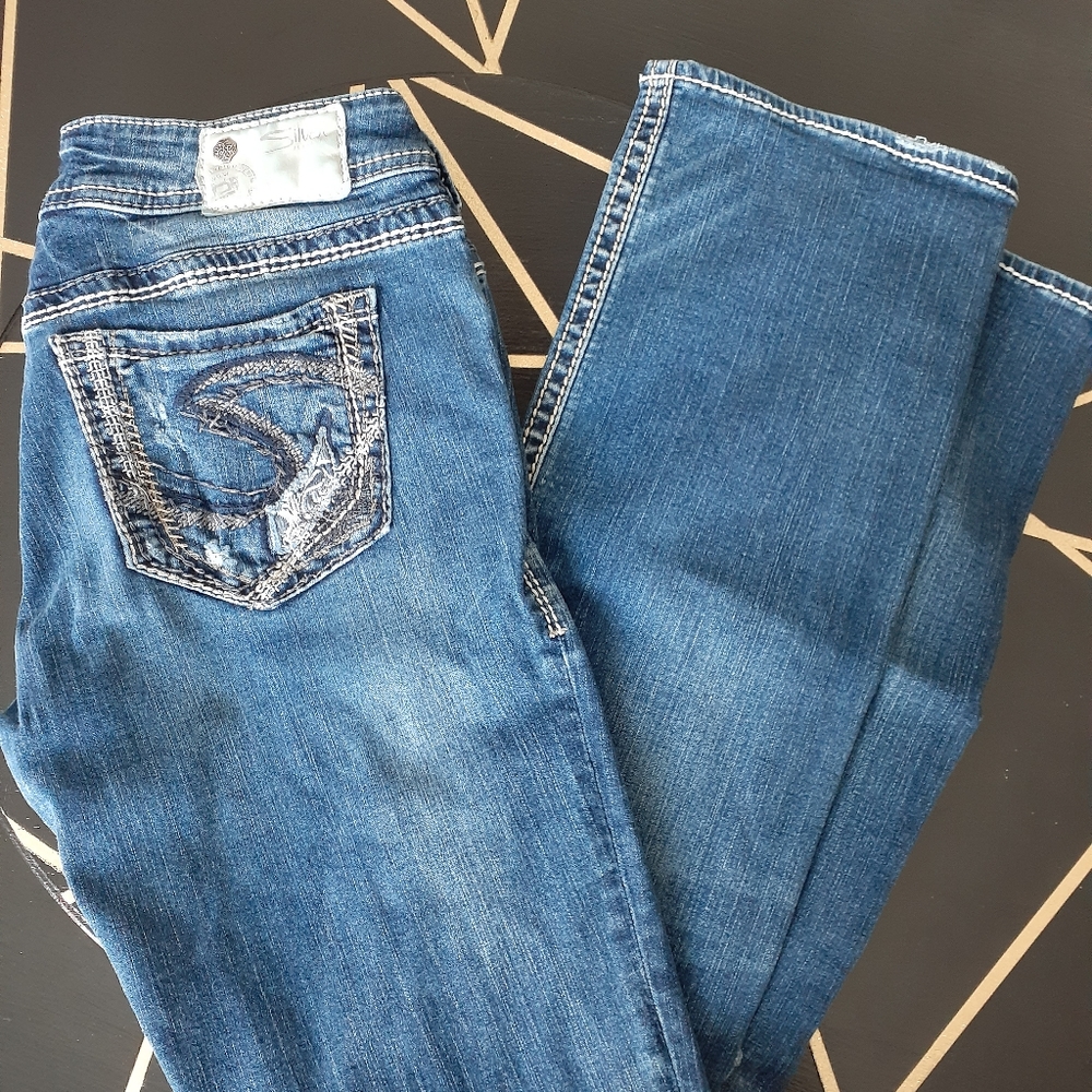 Slightly distressed Silver Jeans boot cut